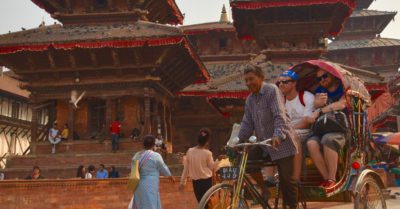 Easy Nepal treks tourist strolling on a rickshaw