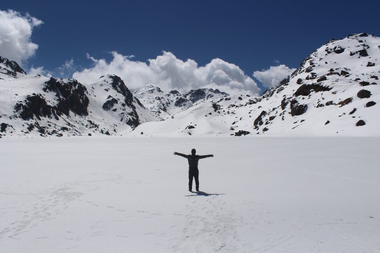 trekkers-standing-middle-of-snow-langtang
