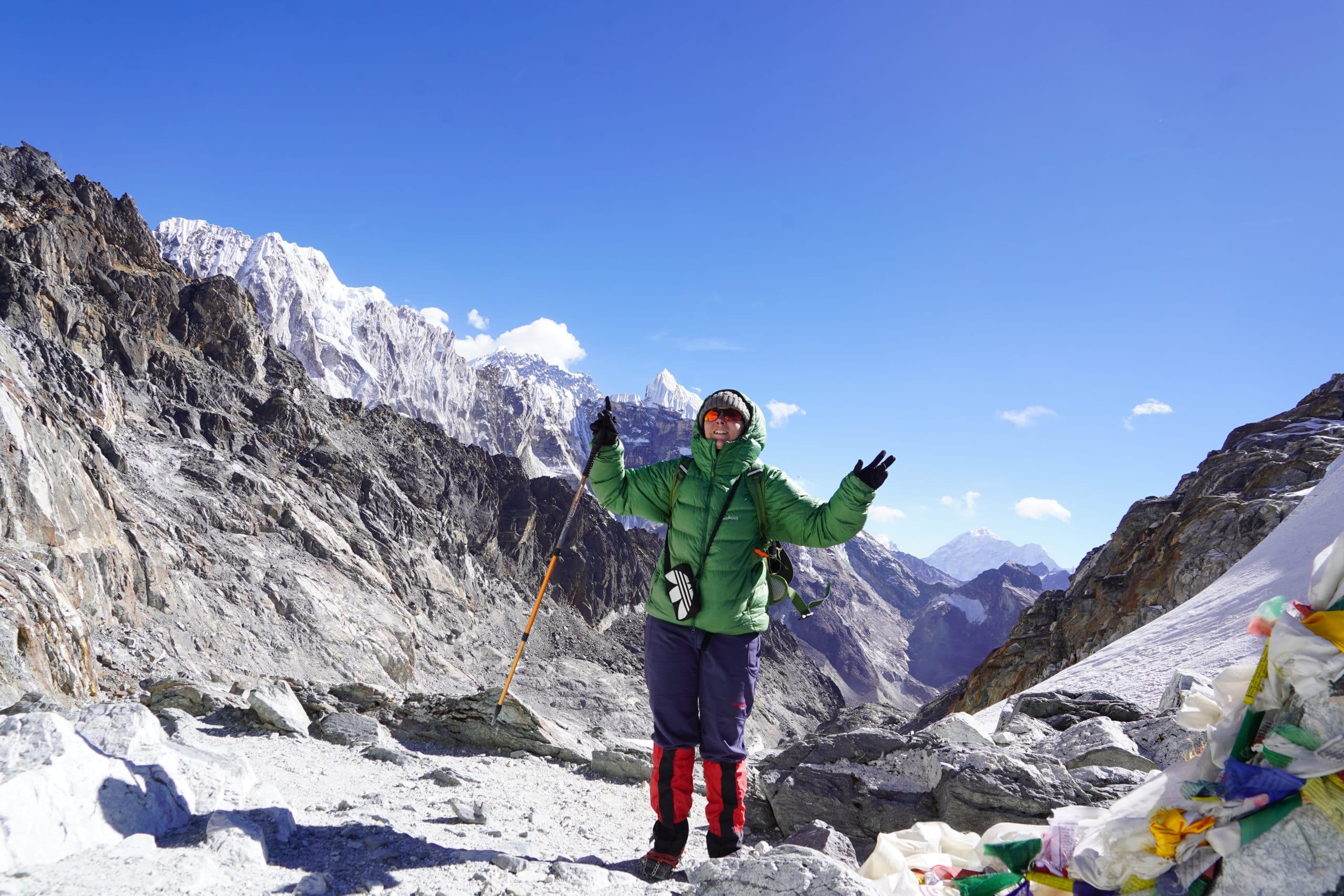 Trekker in full layered gear on the Everest Base Camp trail Nepal 2026