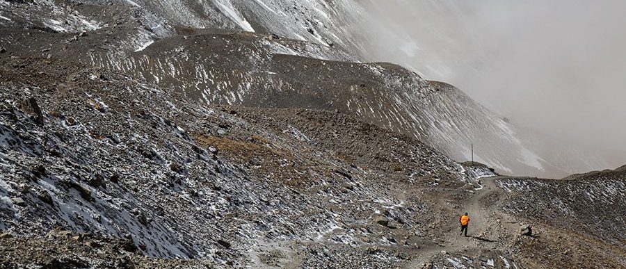 The descent from Thorong La Pass towards Muktinath on the Annapurna Circuit