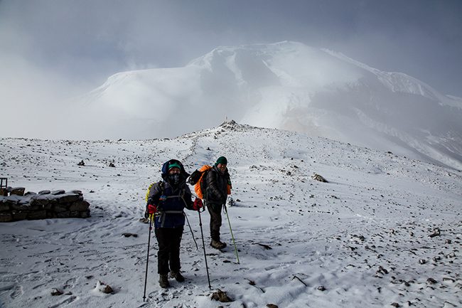 Trekkers crossing Thorong La pass on the Annapurna Circuit, Nepal