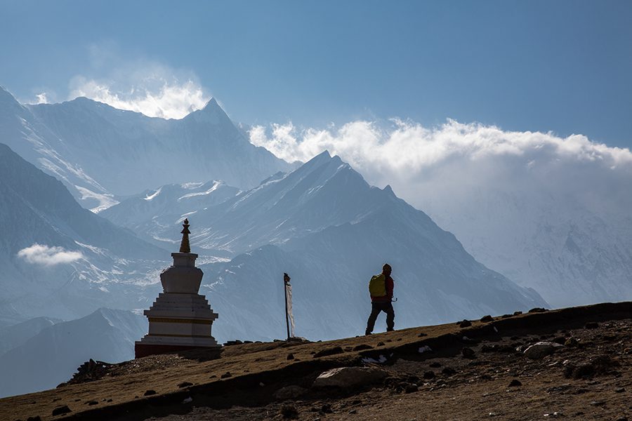 Trekkers hiking up to Ice Lake above Manang