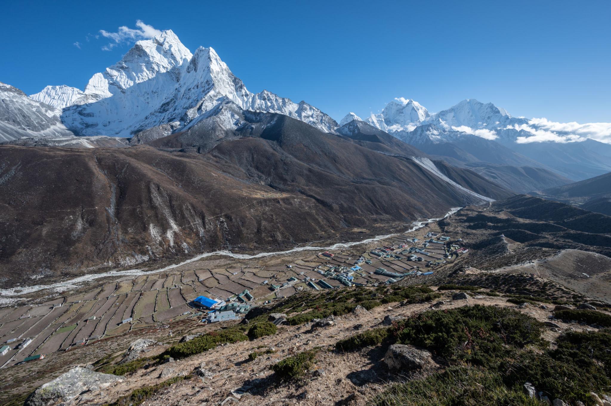 Trekkers on the Nangkartshang ridge above Dingboche