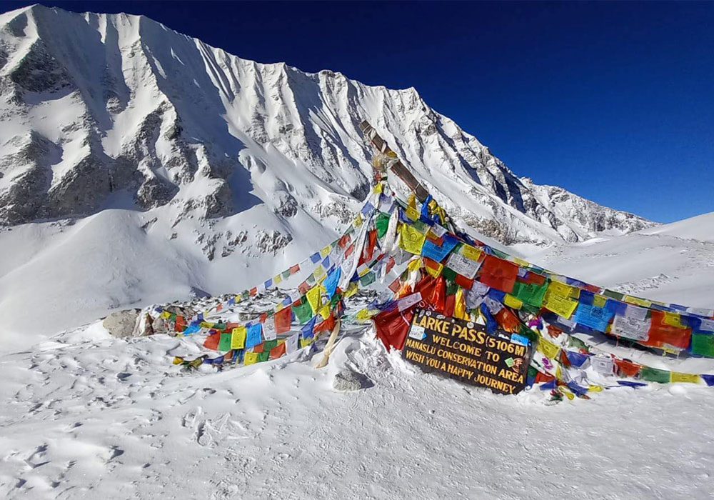 Prayer flags at the top of Larkya La Pass