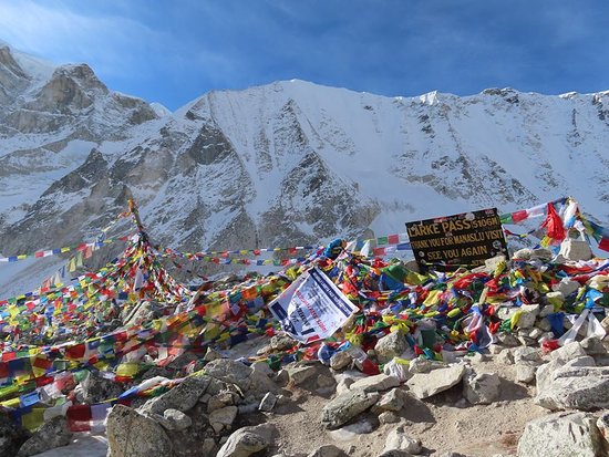 Pass sign on Larkya La on the Manaslu Circuit trek