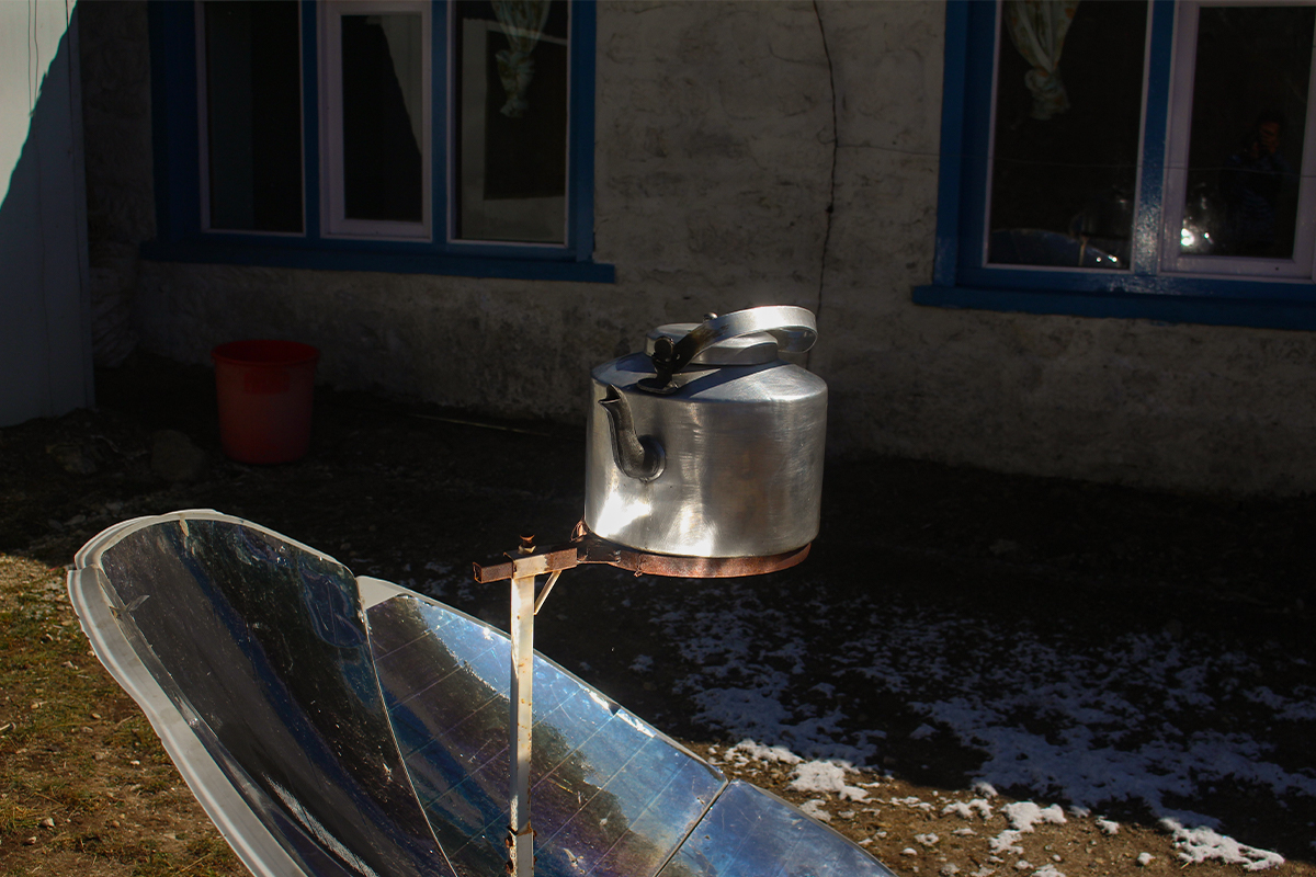 Solar kettle boiling water at a teahouse on a Nepal trek